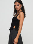 side view of model wearing Princess Polly Manuel Top Black Sleeveless Sweetheart 