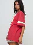 side view of model wearing Princess Polly New York 95 Oversized Tee Red Half Sleeves Crew Neck 