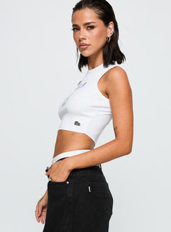 side view of model wearing Princess Polly UCLA Cutoff Tank Top White Sleeveless Crew Neck 