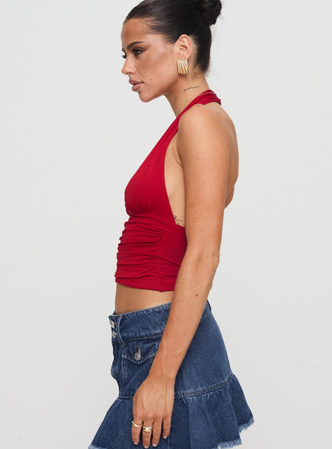 side view of model wearing Princess Polly Love Coast Top Red Sleeveless Plunger 