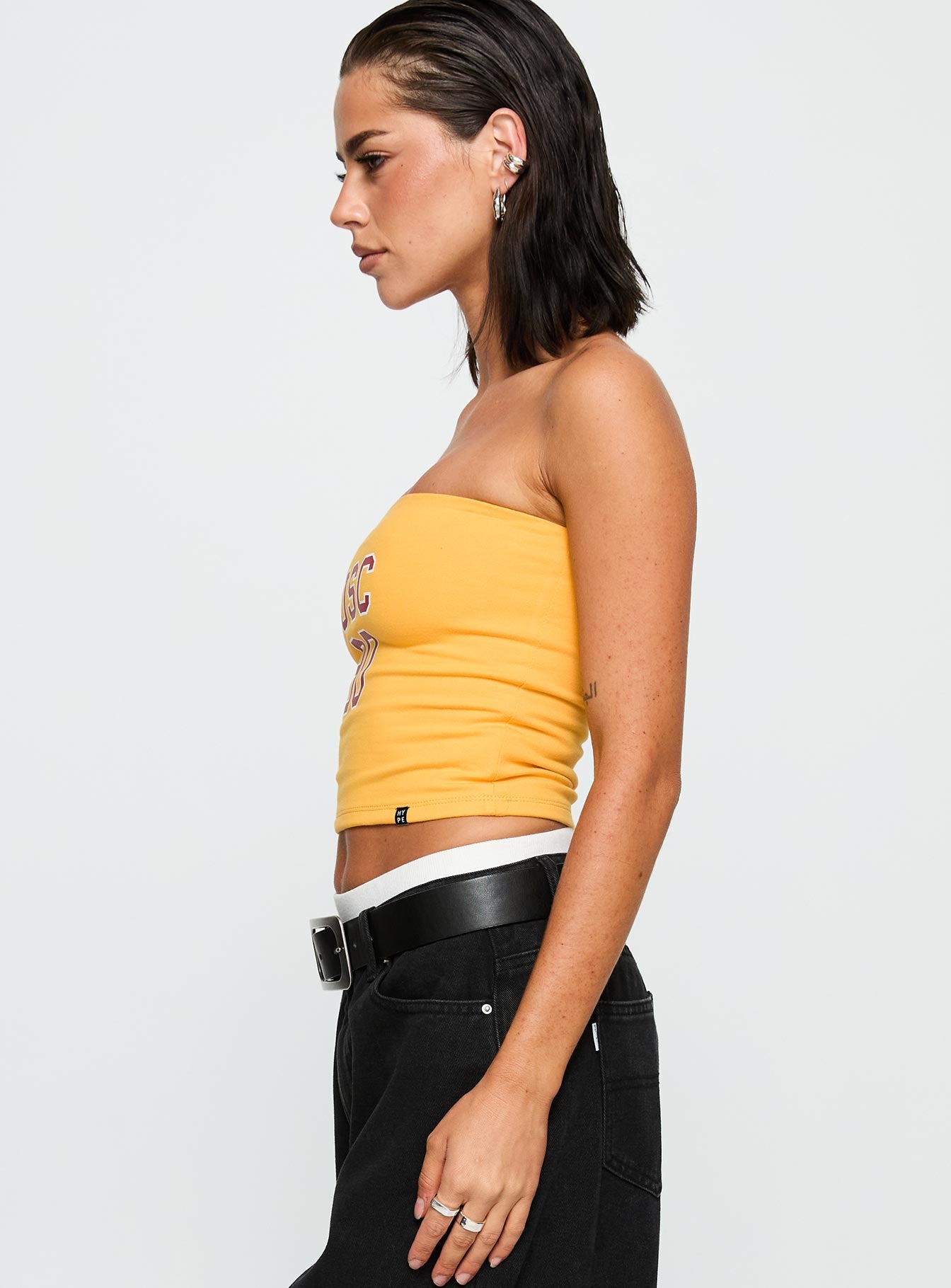 side view of model wearing Princess Polly USC Tube Top Gold Sleeveless straight 