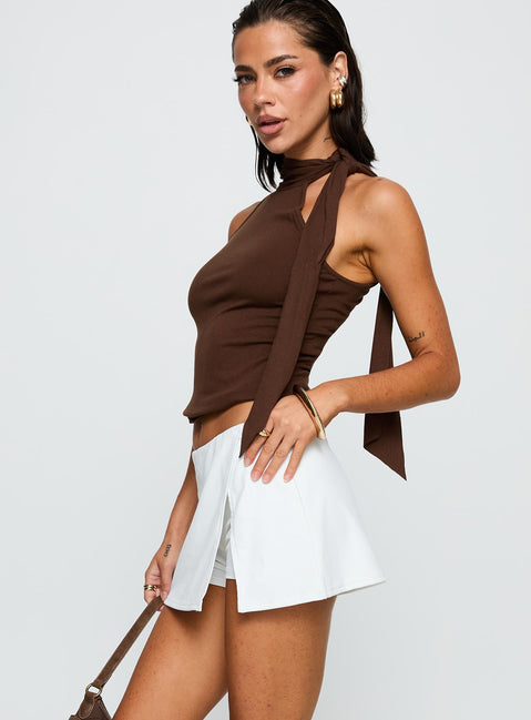 side view of model wearing Princess Polly For The Thrill Skort White High Waisted Shorts 