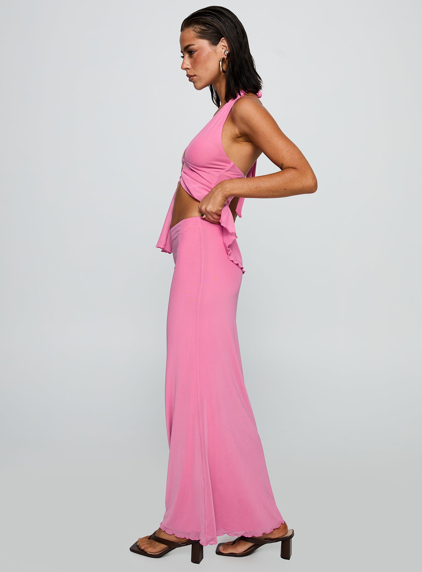   side view of model wearing Princess Polly De Angelo Maxi Skirt Pink Maxi 