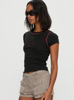 side view of model wearing Princess Polly Cherrie Kisses Top Black Short Sleeves Crew Neck 