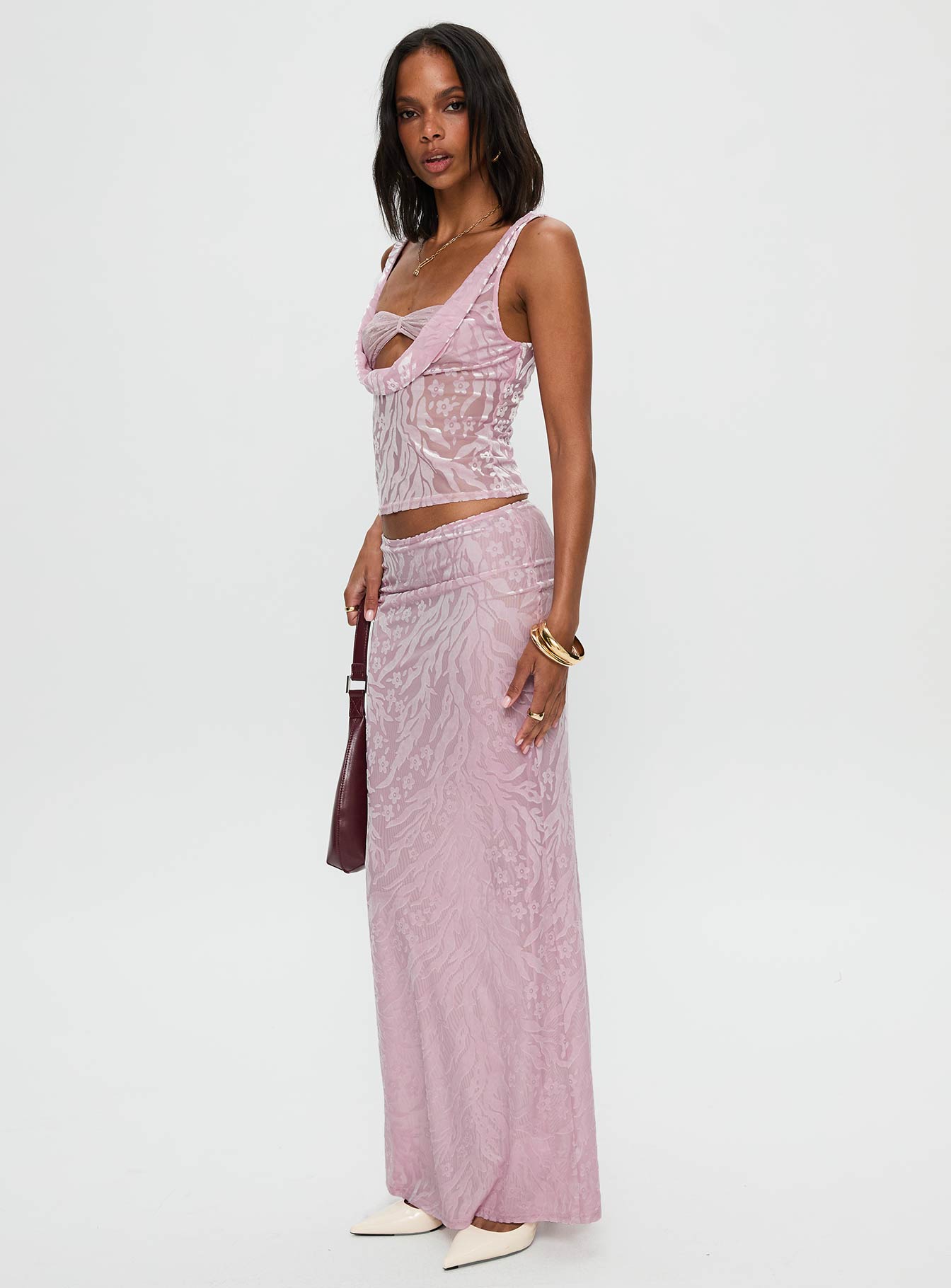   side view of model wearing Princess Polly Kalei Maxi Skirt Pink Floral Maxi 