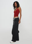 side view of model wearing Princess Polly Pilly Pants Black High Waisted Pants 