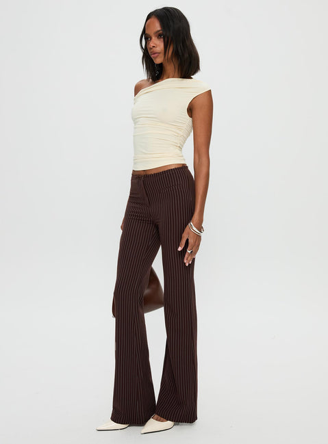 front view of model wearing Princess Polly Sportia Flare Pants Brown High Waisted Pants 