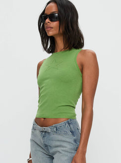 side view of model wearing Princess Polly Girl Almighty Top Green Sleeveless Crew Neck 