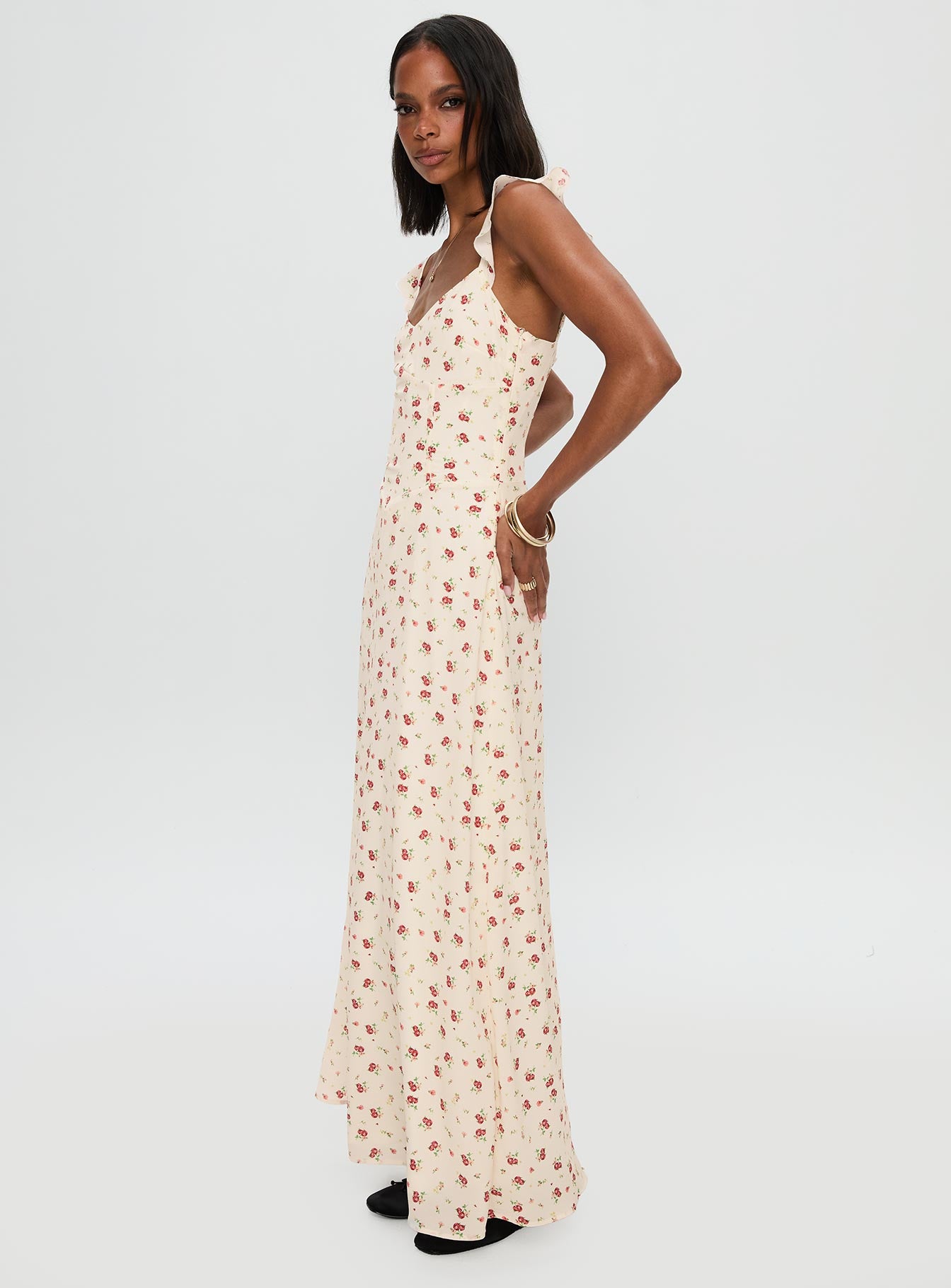 side view of model wearing Princess Polly Maryana Maxi Dress Cream / Multi Sweetheart Neckline 