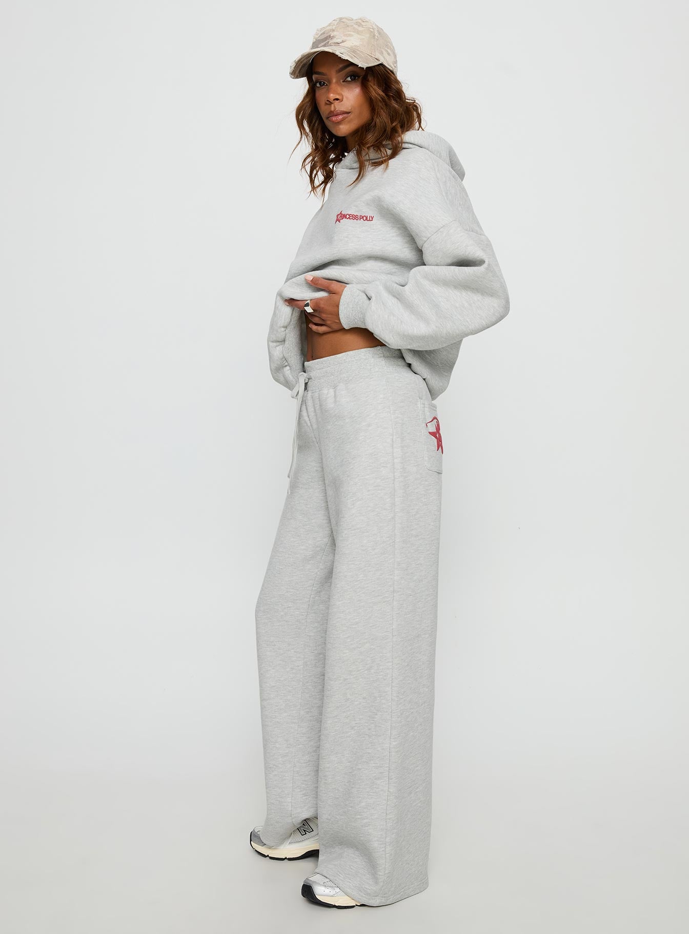 side view of model wearing Princess Polly Princess Polly Stargirl Wide Leg Sweat Pants Grey Marle High Rise Pants 
