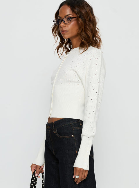 side view of model wearing Princess Polly Head In The Clouds Cardigan Cream cropped 