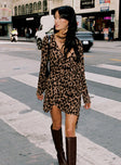 back view of model wearing Princess Polly Raquela Wrap Mini Dress Leopard V-Neck 