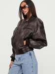 Chocolate brown Biker jacket Faux leather material four pocket design shoulder buttoning detail long sleeves elasticated cuffs and waist zip fastening at front