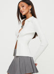 White Top  Long sleeves, classic collar, knit like material  Button fastening at front 