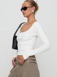 side view of model wearing Princess Polly Daphine Long Sleeve Top White Full Sleeves Scoop Neck 