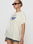 side view of model wearing Princess Polly Lennys Auto Oversized Tee Cream Half Sleeves Crew Neck 