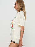 side view of model wearing Princess Polly Fruit Market Oversized Tee White Half Sleeves Crew Neck 