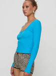 side view of model wearing Princess Polly Daphine Long Sleeve Top Blue Full Sleeves Scoop Neck 