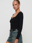 side view of model wearing Princess Polly Daphine Long Sleeve Top Black Full Sleeves Scoop Neck 