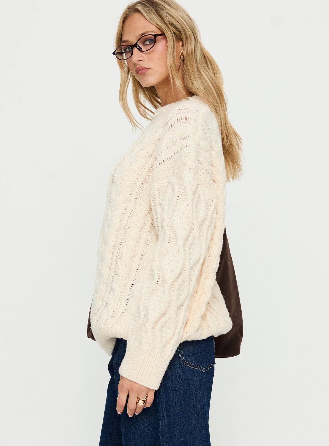 side view of model wearing Princess Polly Rorey Cable Knit Crew Neck Sweater White Longline Jumpers 