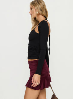   side view of model wearing Princess Polly Celebrations Mini Skirt Wine Mini Skirts 