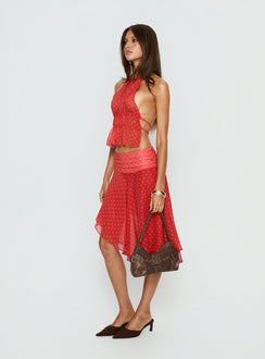   side view of model wearing Princess Polly Legacy Midi Skirt Tomato Polka 