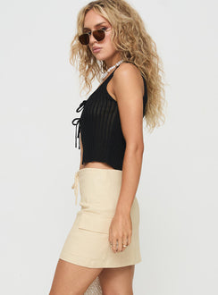   side view of model wearing Princess Polly My Girl Mini Skirt Beige Mini Skirts 