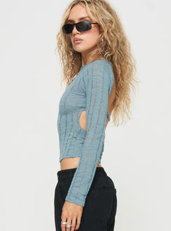 side view of model wearing Princess Polly Oriton Long Sleeve Top Blue Full Sleeves Crew Neck 