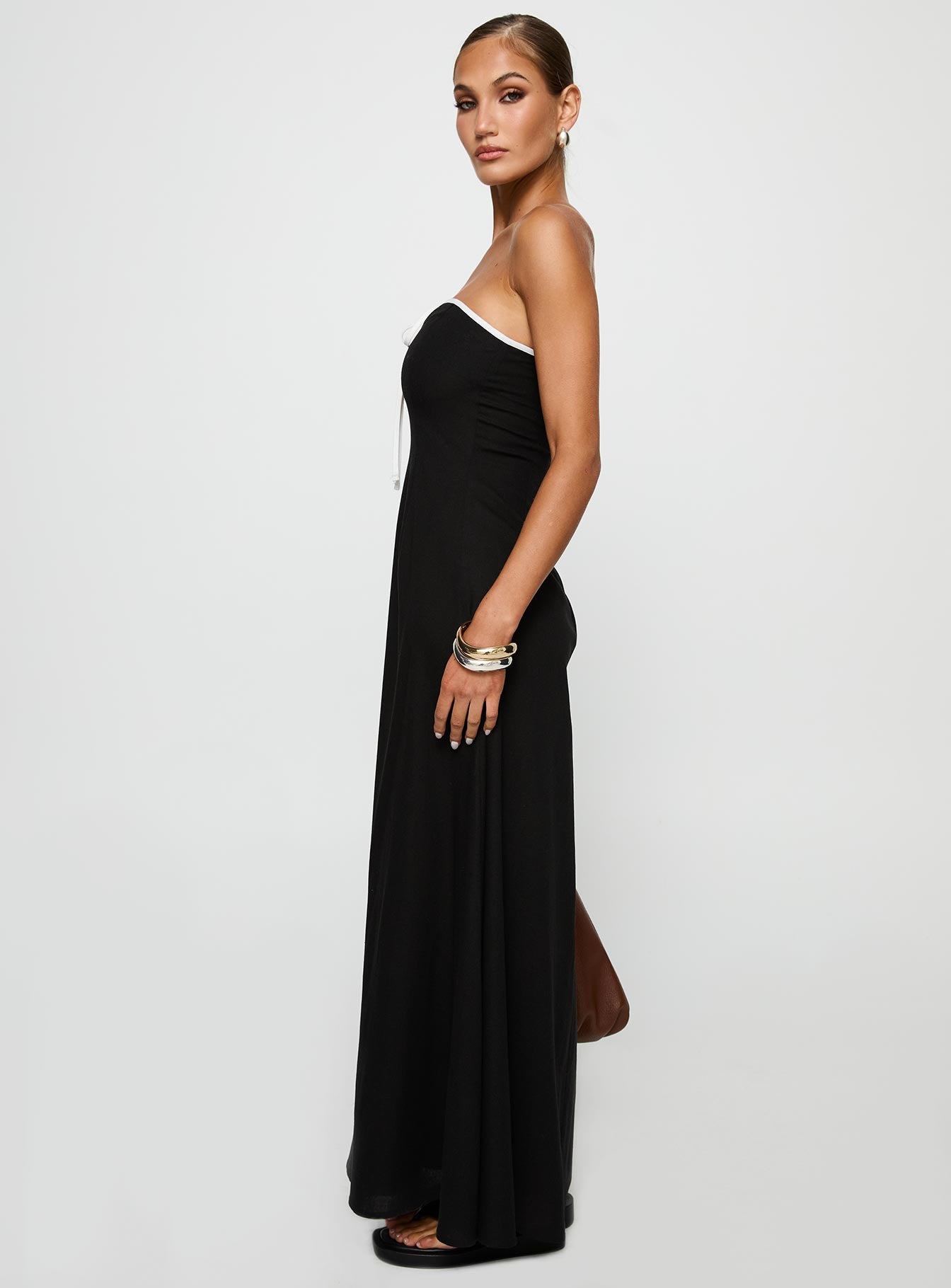 side view of model wearing Princess Polly Bijou Strapless Maxi Dress Black Straight Neck 