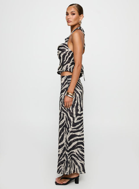   side view of model wearing Princess Polly Eleganza Maxi Skirt Zebra Maxi 