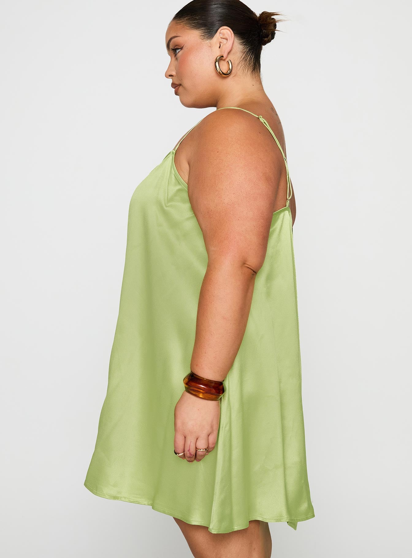 side view of model wearing Princess Polly Apple Cider Mini Dress Green Curve Square Neck 