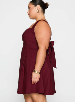 side view of model wearing Princess Polly Xanthus Mini Dress Red Curve Square Neck 