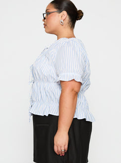 side view of model wearing Princess Polly Alistair Bow Tie Top Blue / White Stripe Curve Half Sleeves Crew Neck 