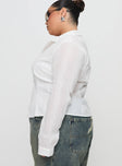 side view of model wearing Princess Polly Fogler Shirt White Curve Full Sleeves V-Neck 