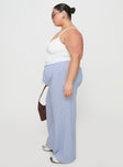 side view of model wearing Princess Polly Holiday Tie Front Pant Blue / White Stripe Curve High Waisted Pants 