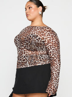 side view of model wearing Princess Polly Believe Me Long Sleeve Top Leopard Curve Full Sleeves Boat Neck 