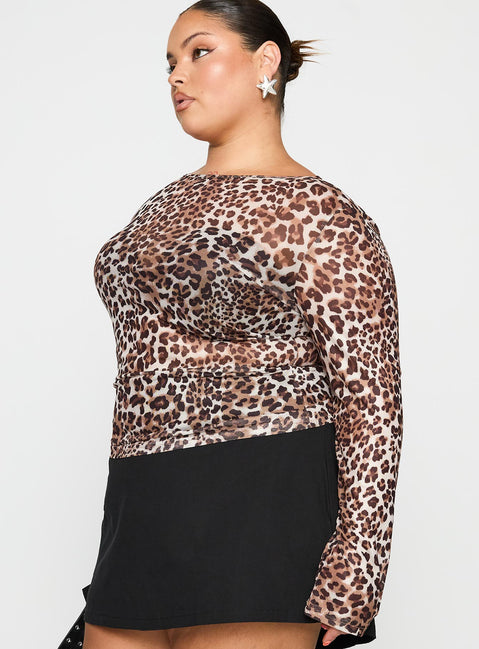side view of model wearing Princess Polly Believe Me Long Sleeve Top Leopard Curve Full Sleeves Boat Neck 