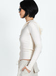 side view of model wearing Princess Polly Elingford Zip Up Hooded Sweater Cream Cropped 