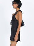 side view of model wearing Princess Polly Lanier Mini Dress Black Petite Plunger 