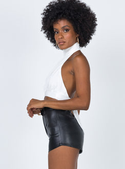 side view of model wearing Princess Polly Siena Shorts Black High Waisted Shorts 