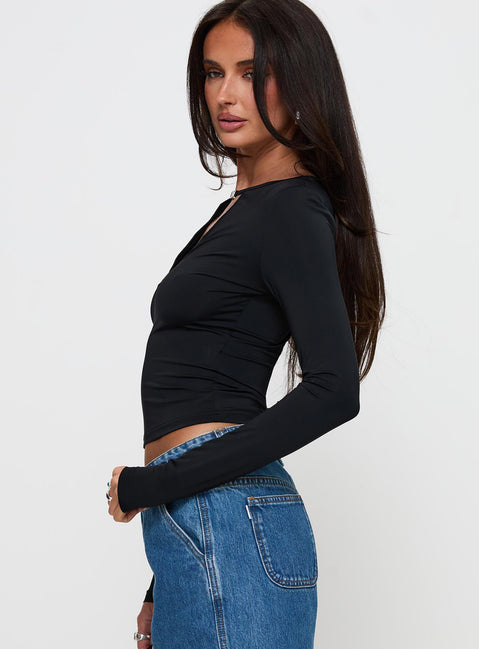 side view of model wearing Princess Polly Layna Long Sleeve Plunge Neck Top Black Full Sleeves V-Neck 