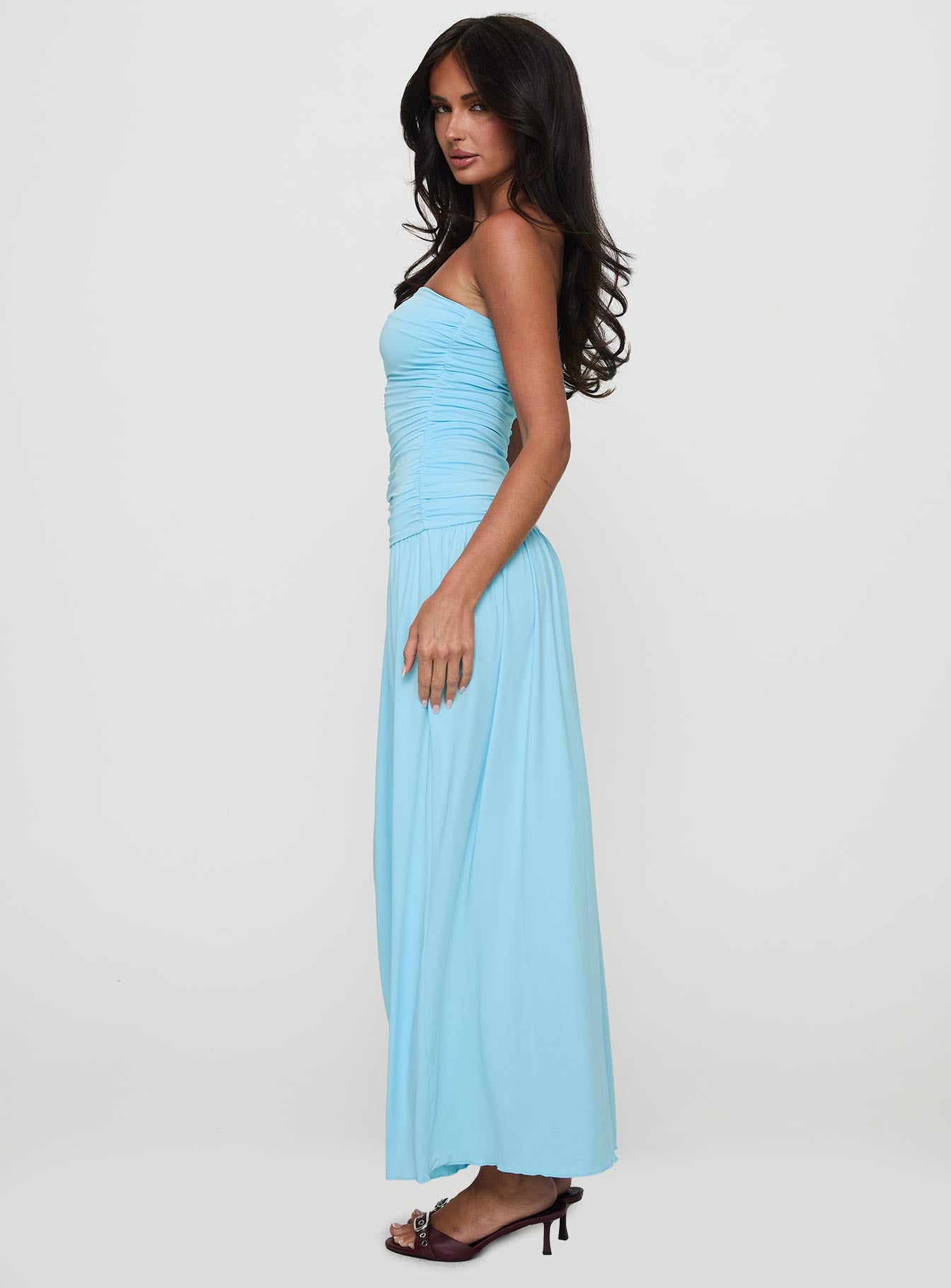 side view of model wearing Princess Polly Glorie Strapless Maxi Dress Light Blue Petite Straight Neck 