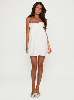 front view of model wearing Princess Polly Marliene Broiderie Mini Dress White Sweetheart Neckline 