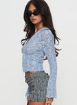 side view of model wearing Princess Polly Azai Long Sleeve Top Blue Full Sleeves V-Neck 