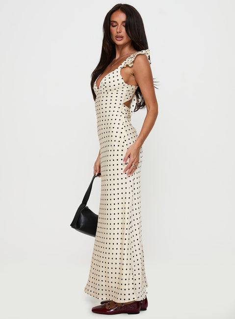 side view of model wearing Princess Polly Odeliah Polka Maxi Dress Cream Plunger 