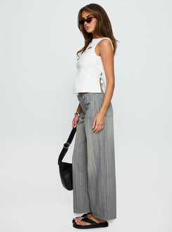 side view of model wearing Princess Polly Lifetimes Mid Rise Wide Leg Cargo Jeans Dark Blue Stripe Mid Rise Jeans 