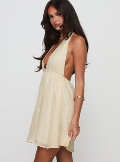 side view of model wearing Princess Polly Plus One Mini Dress Beige Plunger 