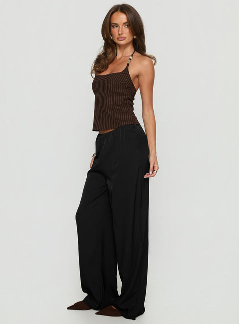 side view of model wearing Princess Polly Breina Satin Straight Leg Pants Black High Rise Pants 