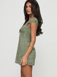 side view of model wearing Princess Polly Alora Mini Dress Green Sweetheart Neckline 