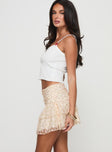Mini skirt, floral lace print Ruched detail at front, tiered hem, invisible side zip fastening at side Good stretch, fully lined